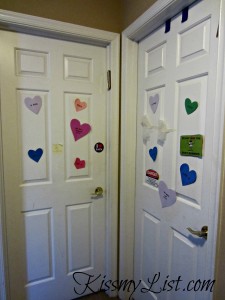 They tape their own things to their doors (that's bubble wrap on my son's!), but they won't take down the hearts!